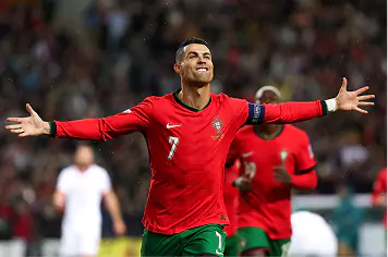 Cristiano Ronaldo celebrating a goal in the Portugal national team jersey